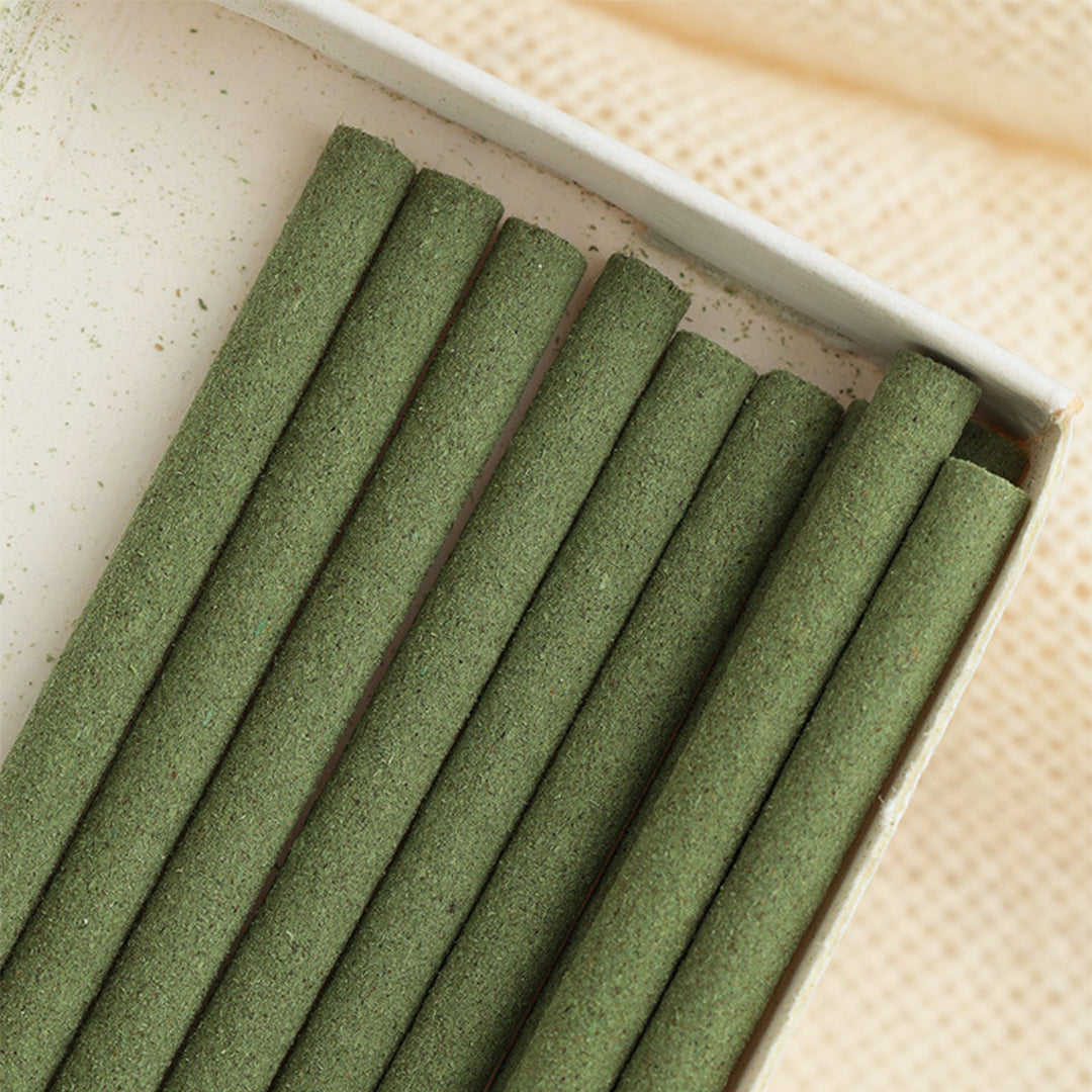 Close-up of black tea incense stick showing texture and size detail