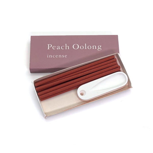 Box of white peach oolong incense with 10 sticks and soft white plaster holder