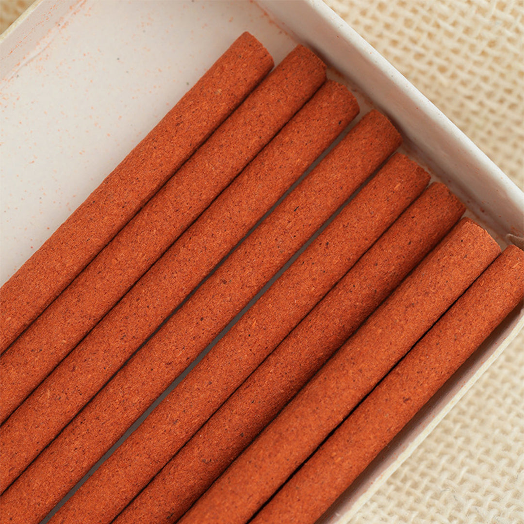 Close-up of white peach incense stick showing smooth texture and delicate tone