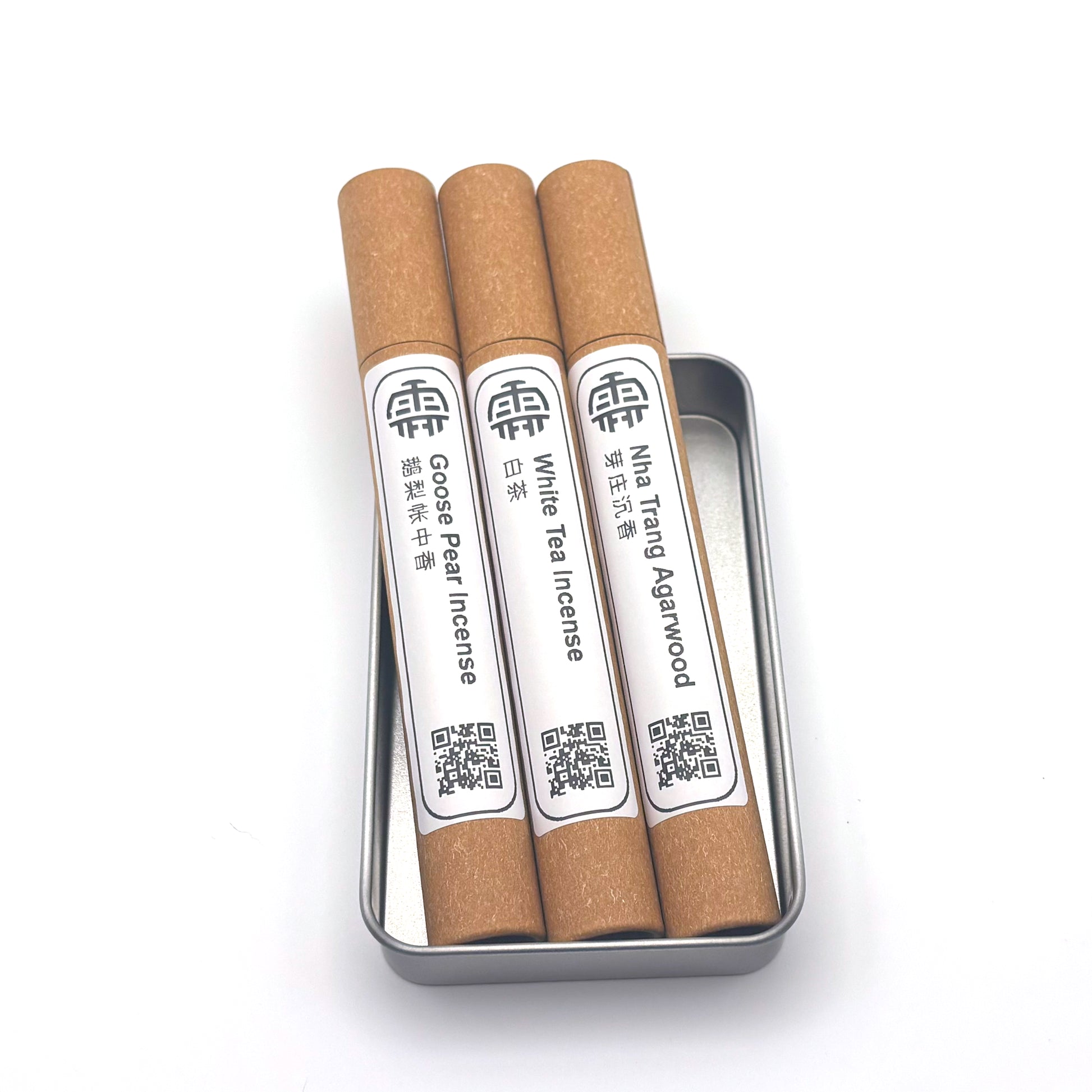 Day to Night Incense Trio – White Tea, Goose Pear, and Nha Trang Agarwood incense tubes in a tin box