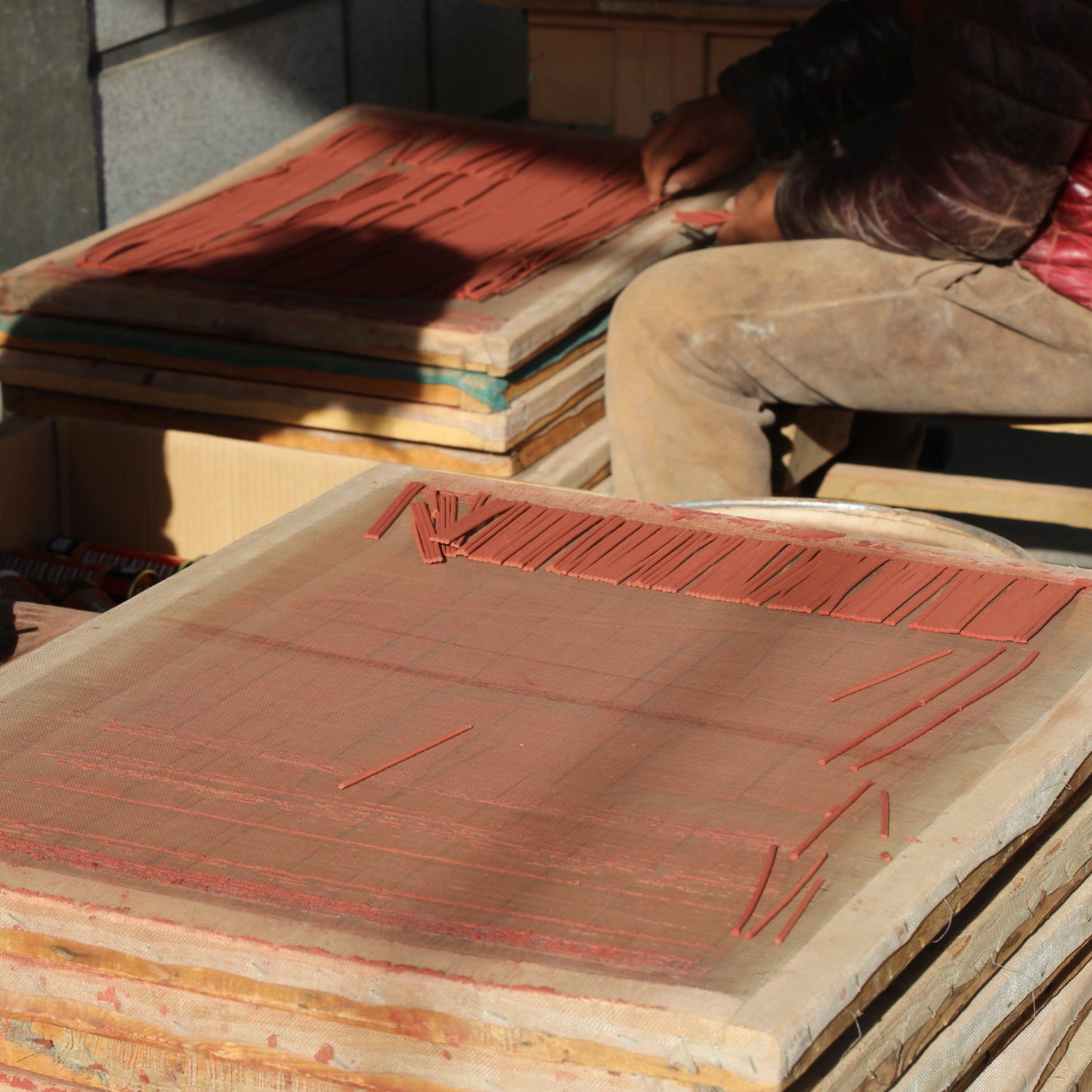 Tibetan incense drying in the sun – traditional handmade process