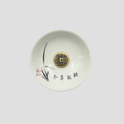 Top view of ceramic incense holder with Chinese coin design