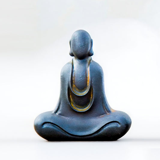 Front view of No-Face Zen Monk Statue in greeting pose, rustic zen decor ornament